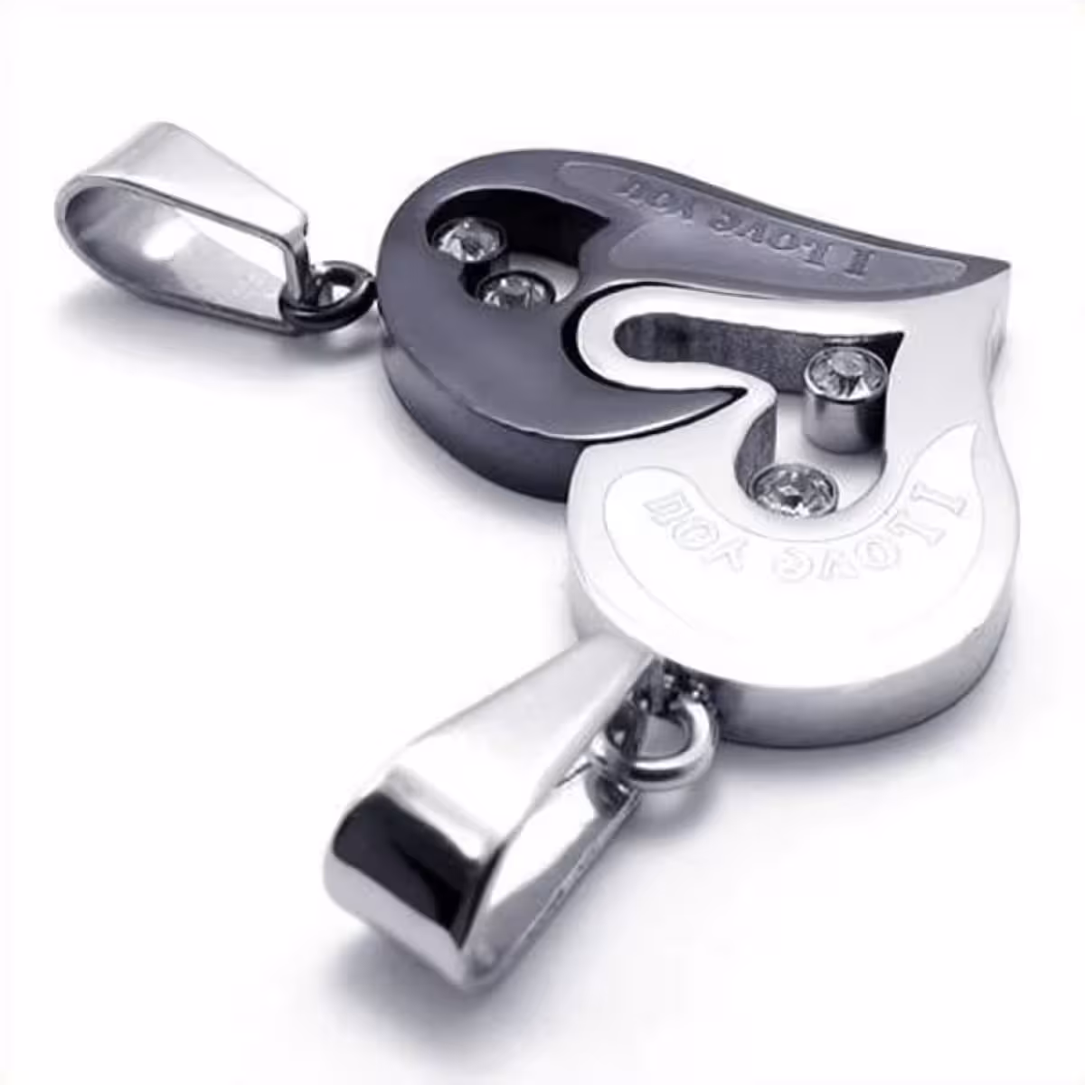 Sirds kuloni sudraba un melnā krāsā pāriem