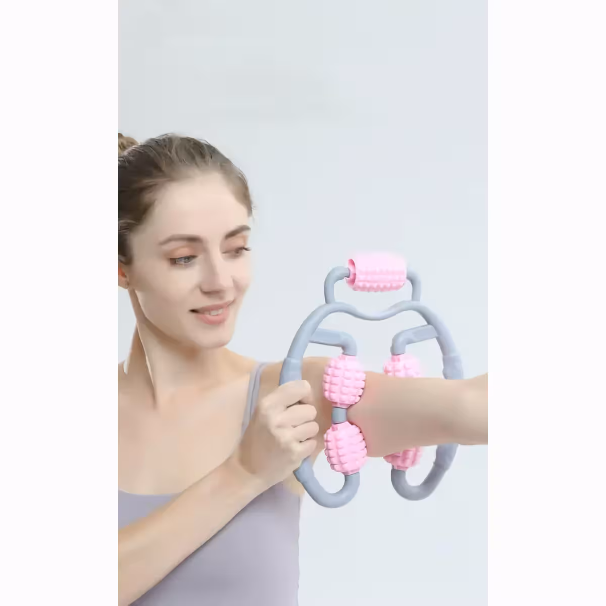 Rokas masāžas ierīce ar ruļļiem noguruma samazināšanai